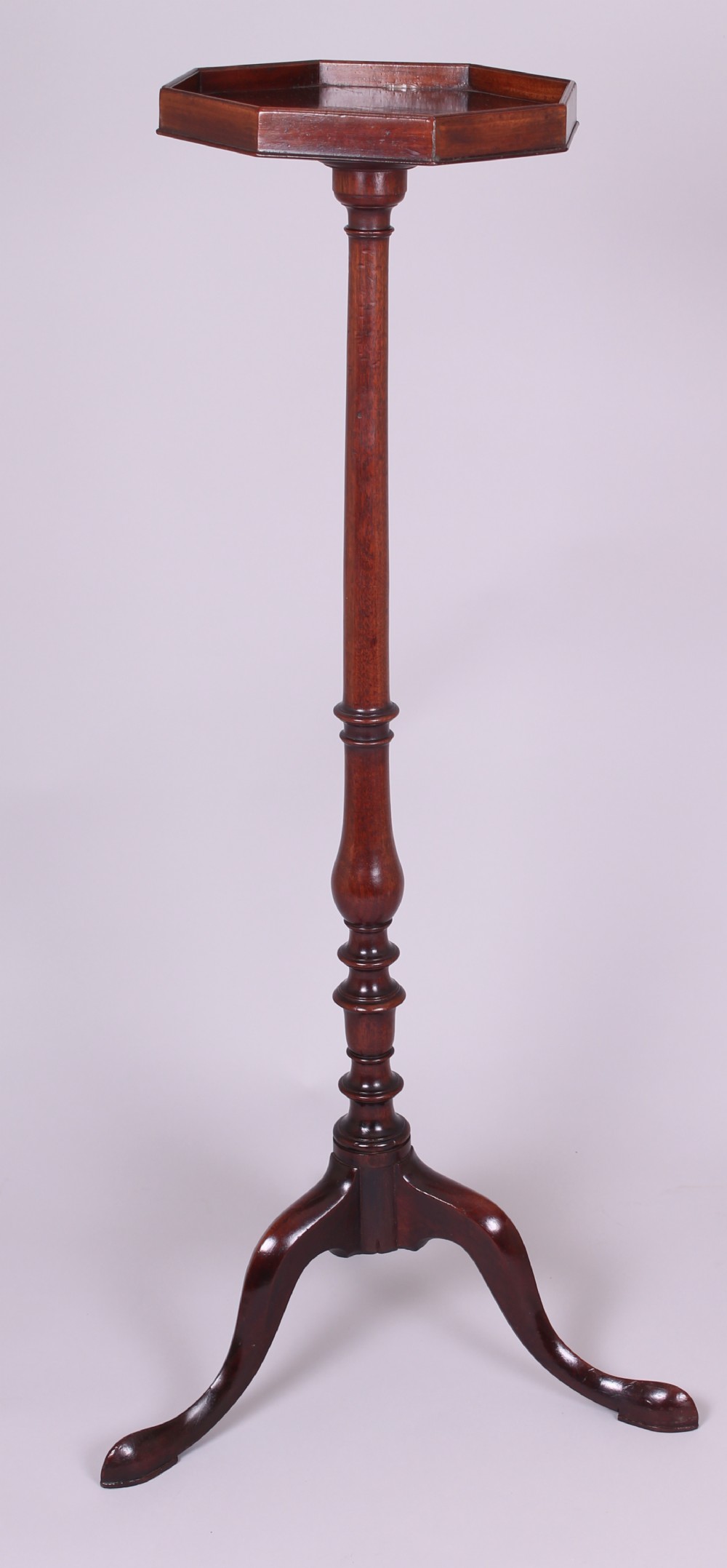 Mahogany torchere with an octagonal galleried top