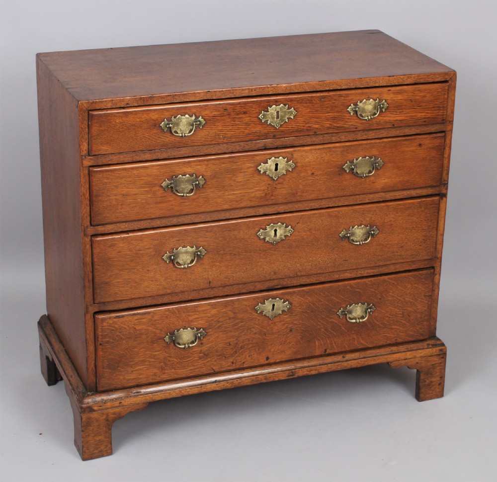 Rare George II period oak chest of drawers of diminutive size; 