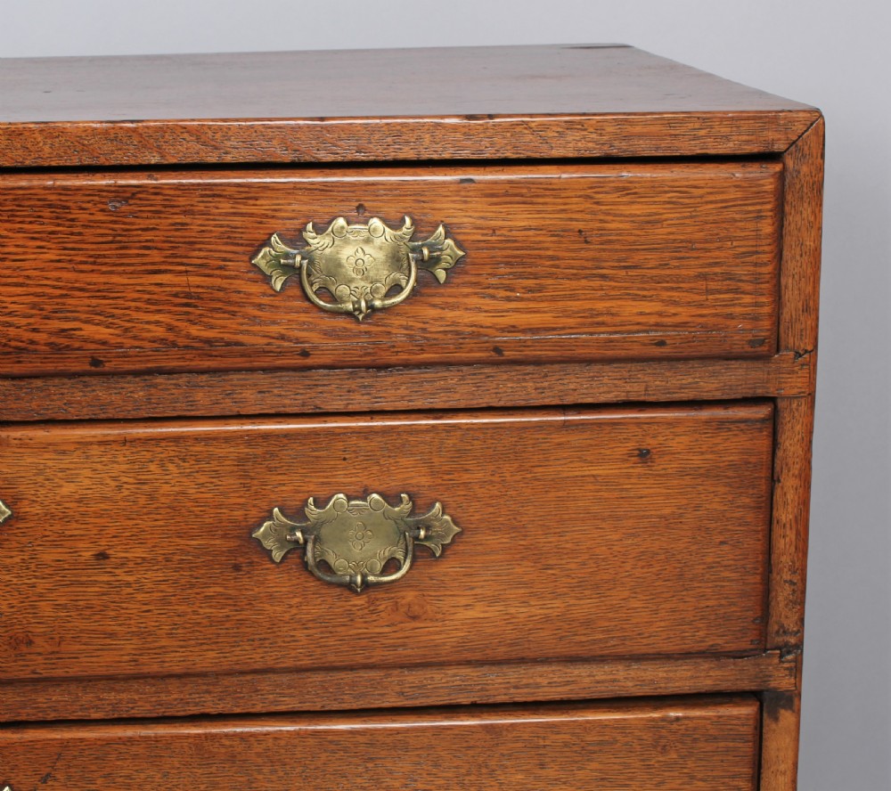 Rare George II period oak chest of drawers of diminutive size;  View II