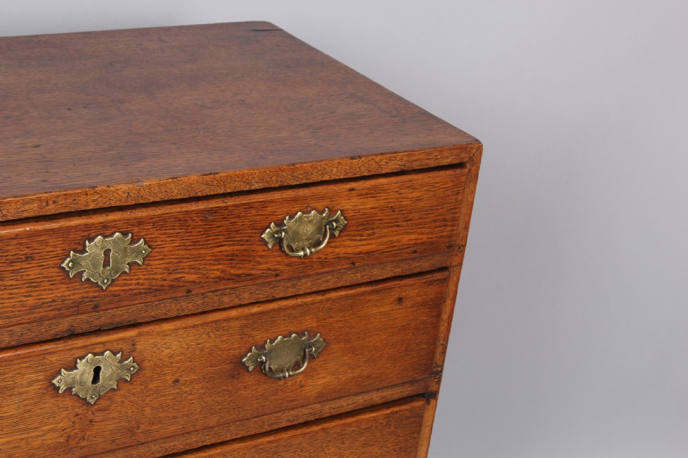Rare George II period oak chest of drawers of diminutive size;  View IV