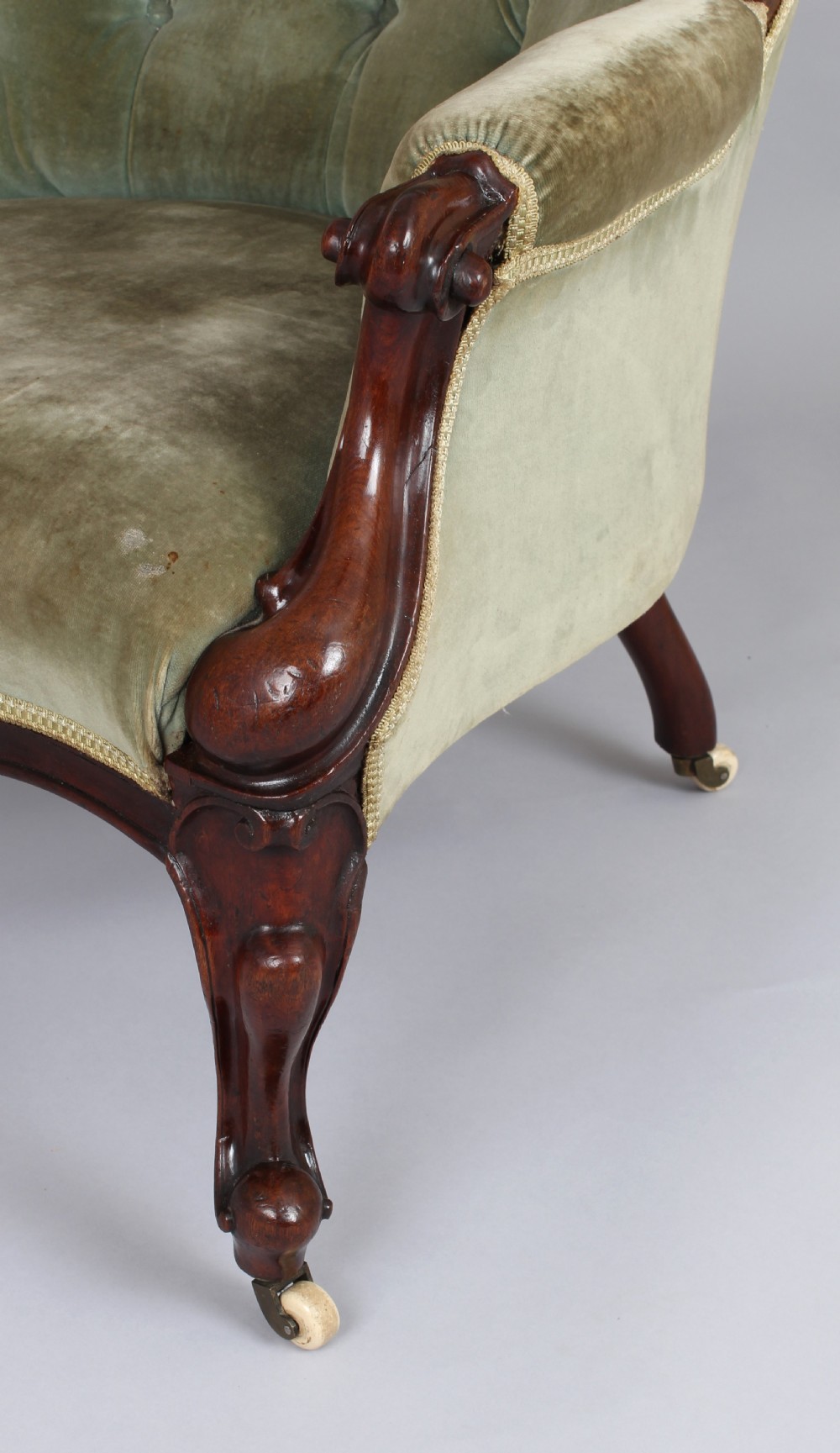 A pair of mid-Victorian comfortable easy chairs View III