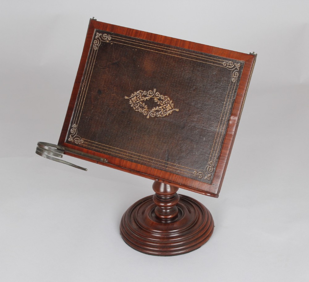 A fine quality early 19th century mahogany adjustable table reading-stand