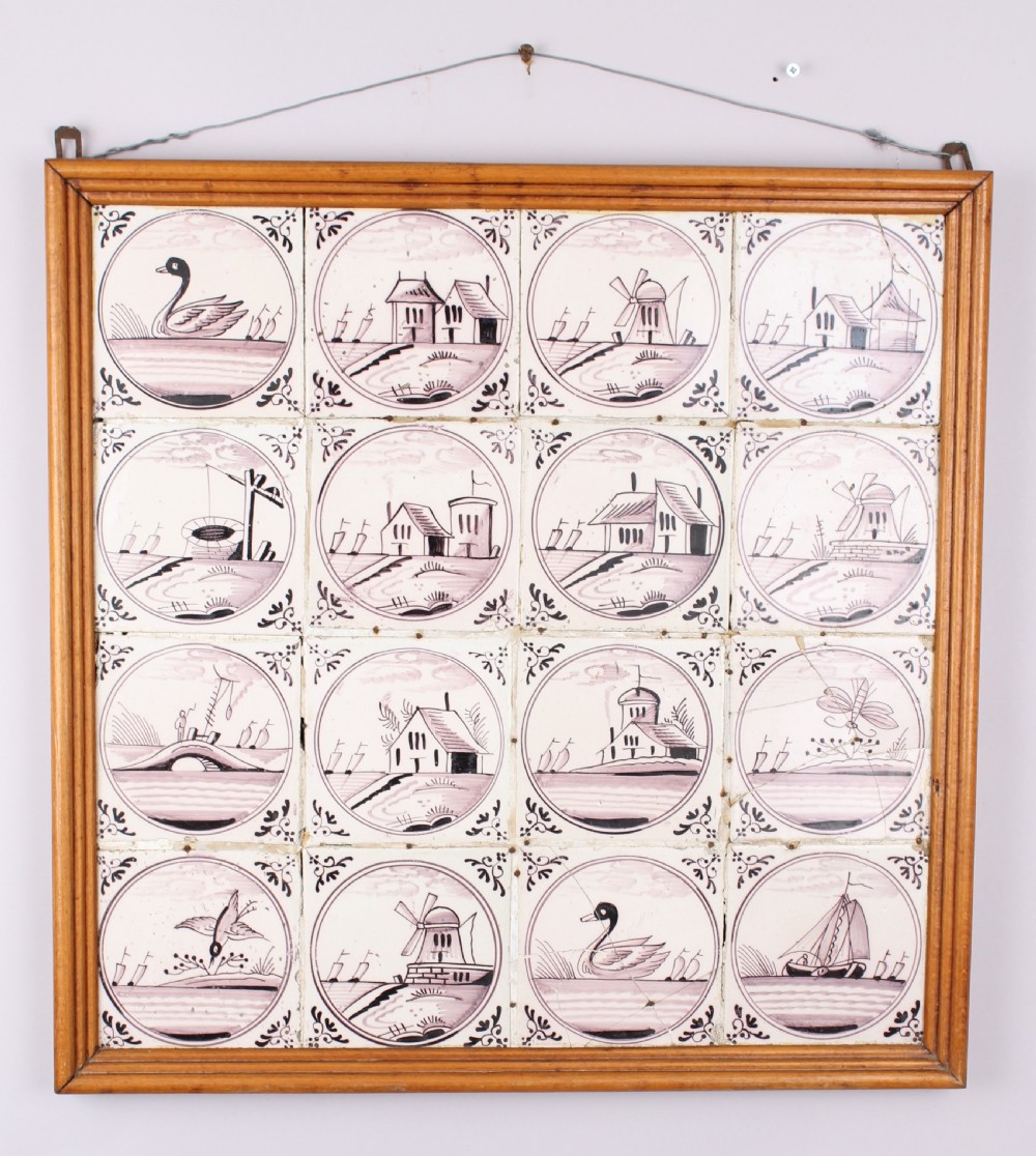 A framed set of sixteen Delft tiles