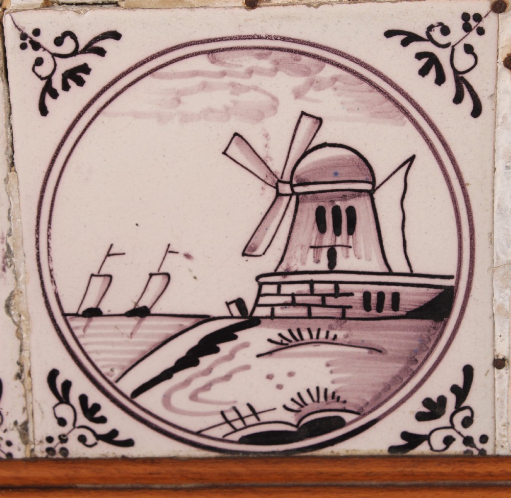 A framed set of sixteen Delft tiles View V