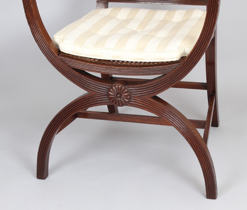 Pair of 19th century mahogany X-framed elbow-chairs of Regency character View IV