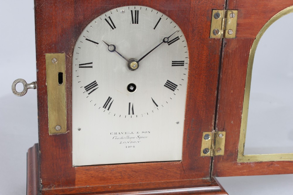 A fine George IV period mahogany mantel / library clock View IV