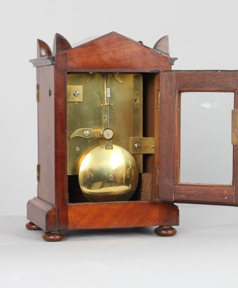 A fine George IV period mahogany mantel / library clock View V