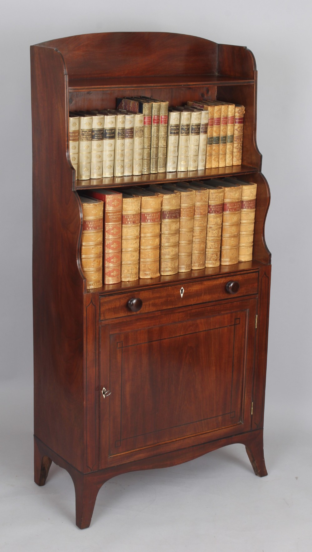 George III period mahogany cupboard base water fall bookshelves  View III
