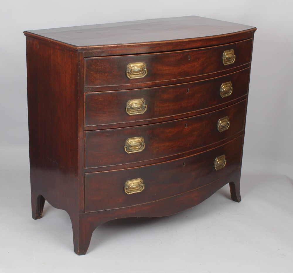 George III mahogany bow-fronted chest of four graduated drawers View II