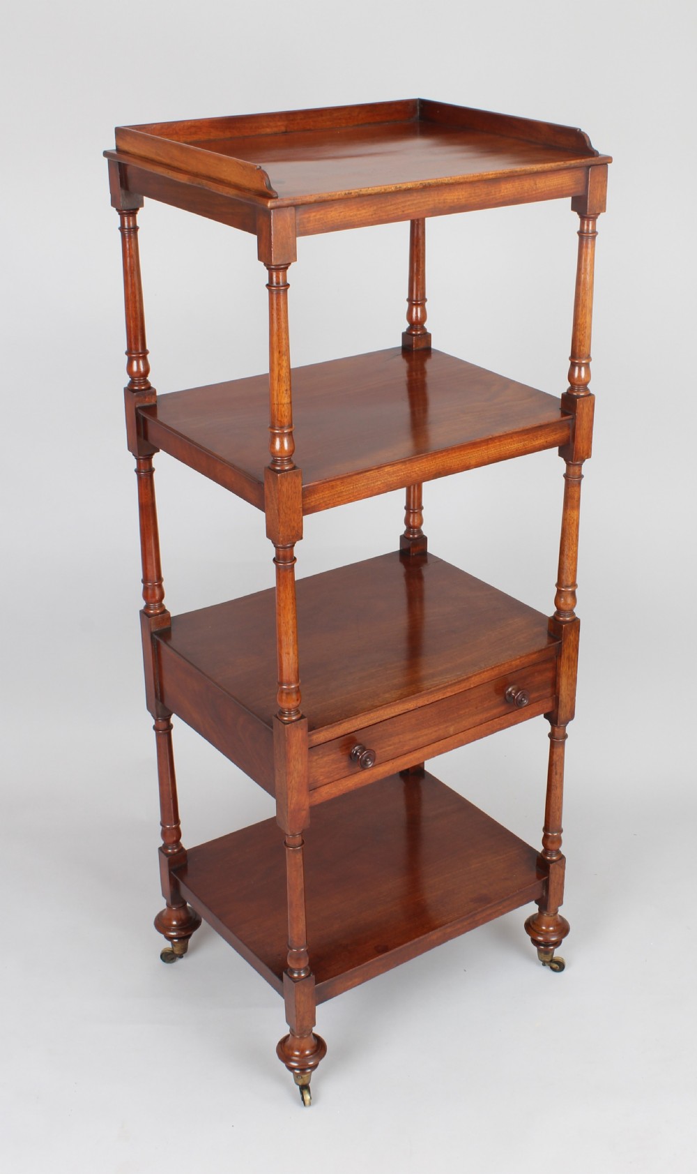 Early 19th century mahogany whatnot with four tiers