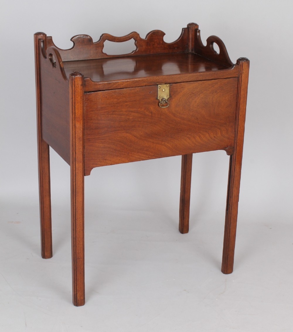 An unusual George III period mahogany night table View II