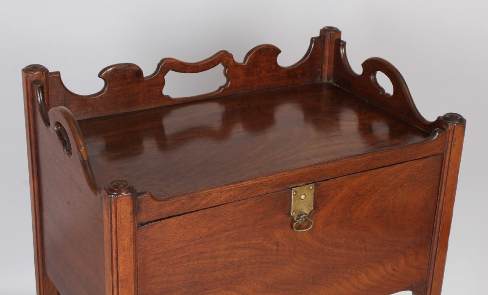 An unusual George III period mahogany night table View III