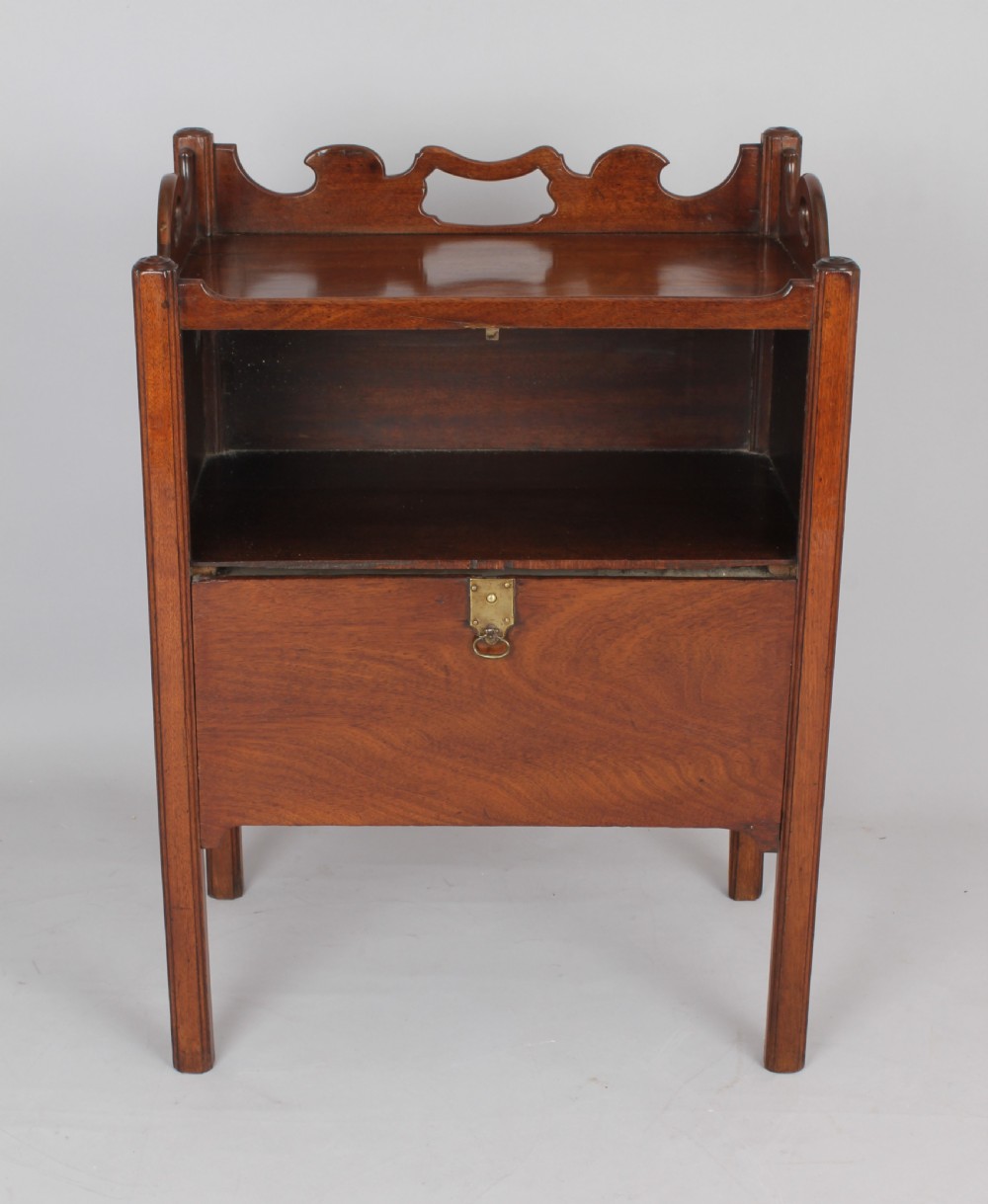 An unusual George III period mahogany night table View VI