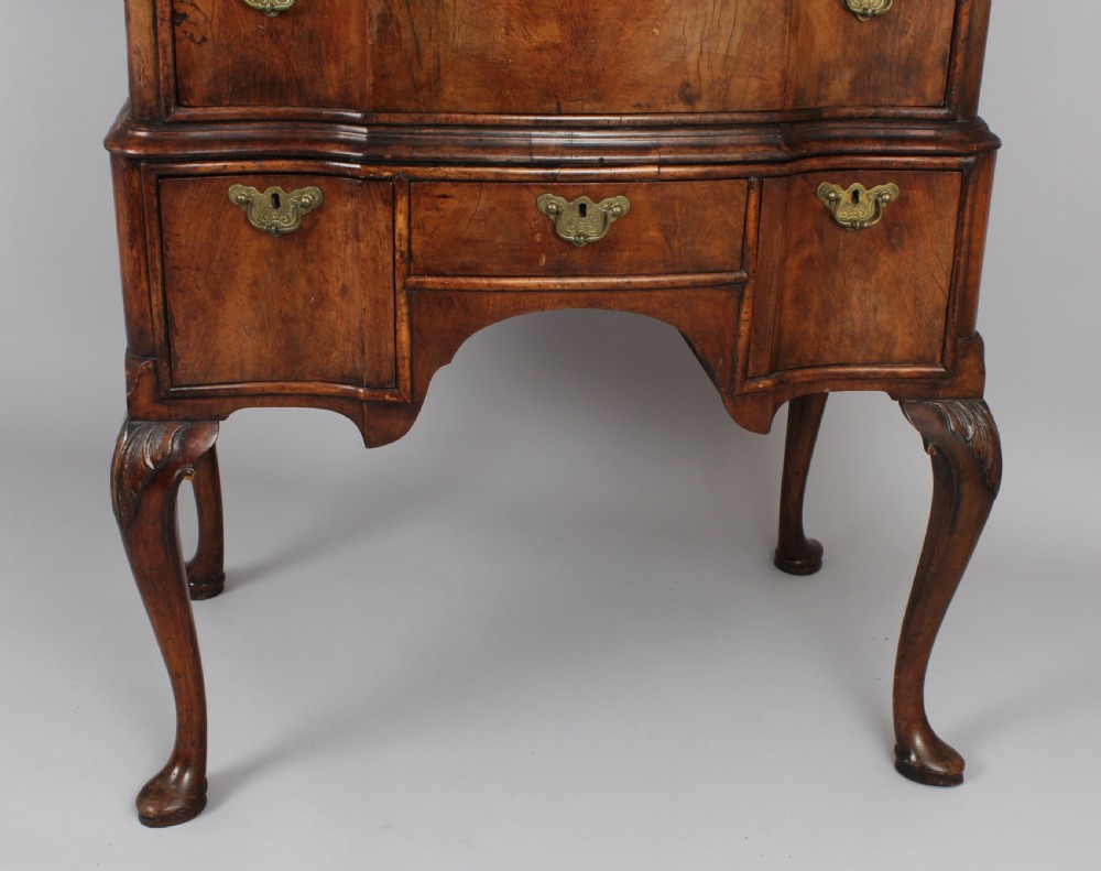 Queen Anne revival walnut chest on stand with a shaped front View II