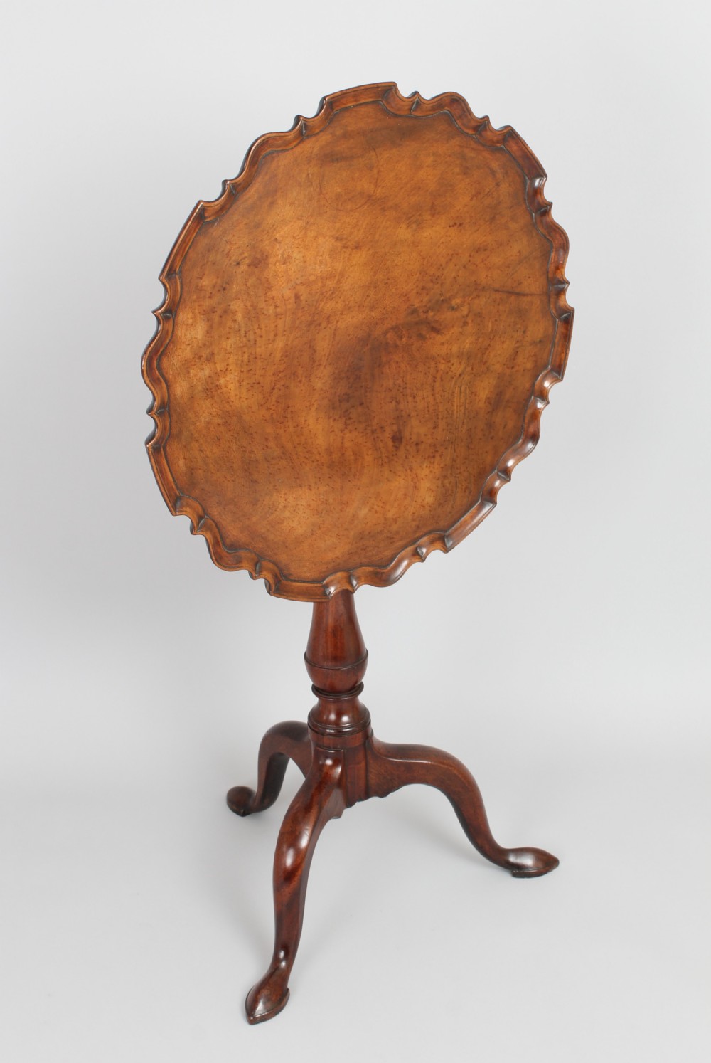 A George III period mahogany tripod table View IV