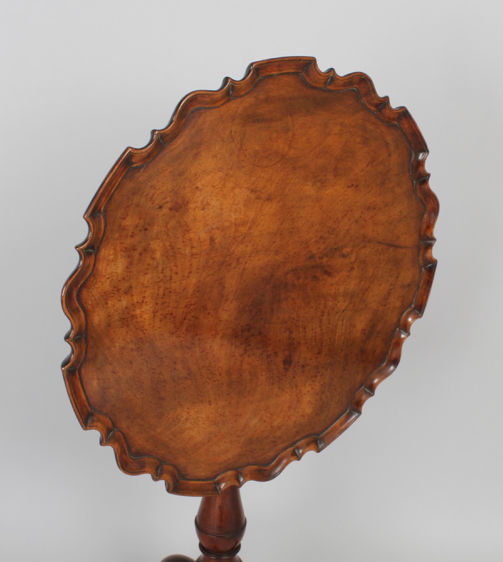 A George III period mahogany tripod table View V