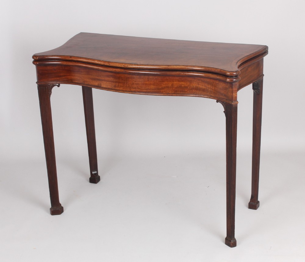 Mahogany serpentine card table