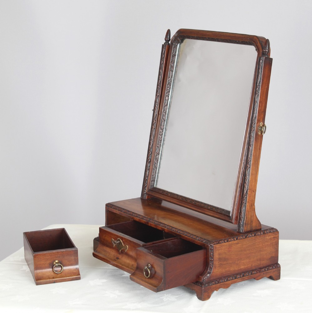 A mahogany dressing table toilet mirror with exceptional carved detail; View III