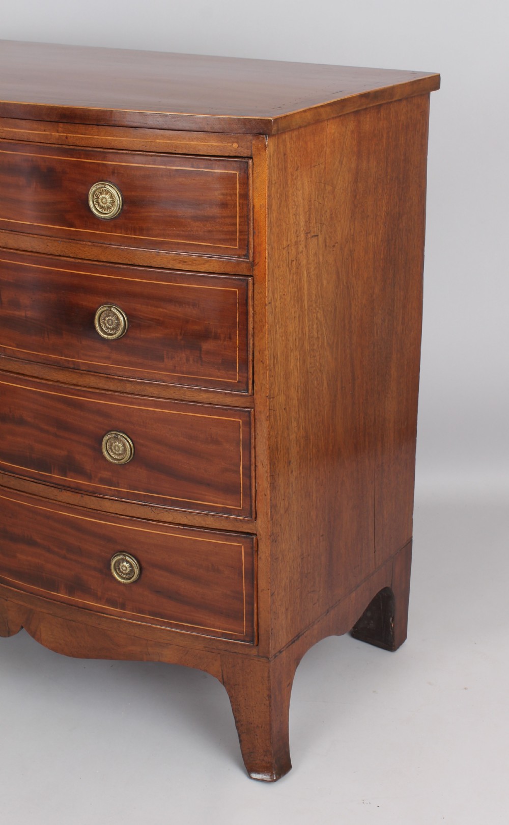 Mahogany bow-fronted chest of four graduated drawers View III