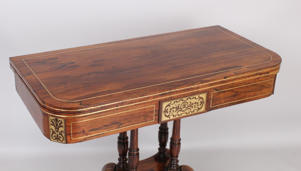 Regency rosewood D-shaped games table with a revolving top View II