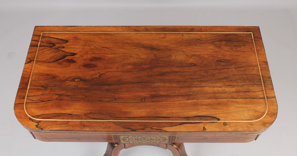 Regency rosewood D-shaped games table with a revolving top View VI