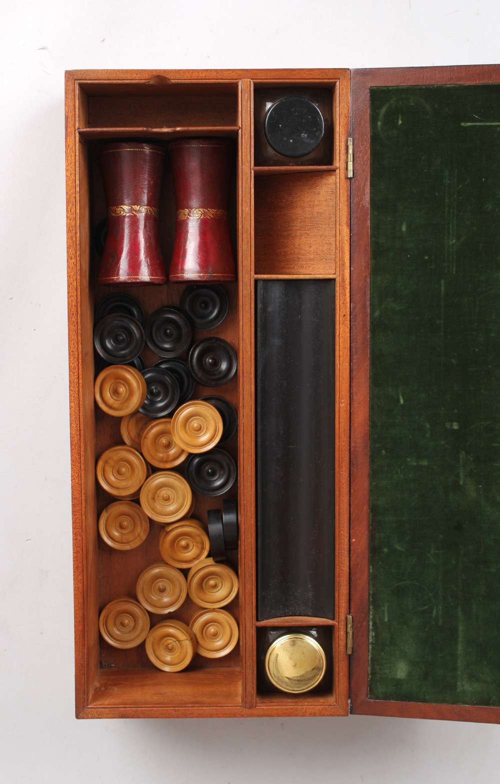 An open early Victorian rosewood games compendium featuring small wooden drawers, a green velvet playing surface, and a red gilt-tooled backgammon interior section. View X