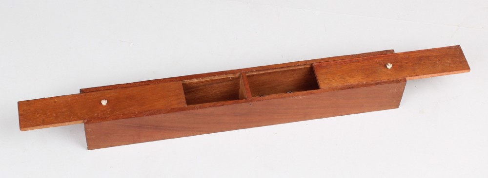 An open early Victorian rosewood games compendium featuring small wooden drawers, a green velvet playing surface, and a red gilt-tooled backgammon interior section. View XII