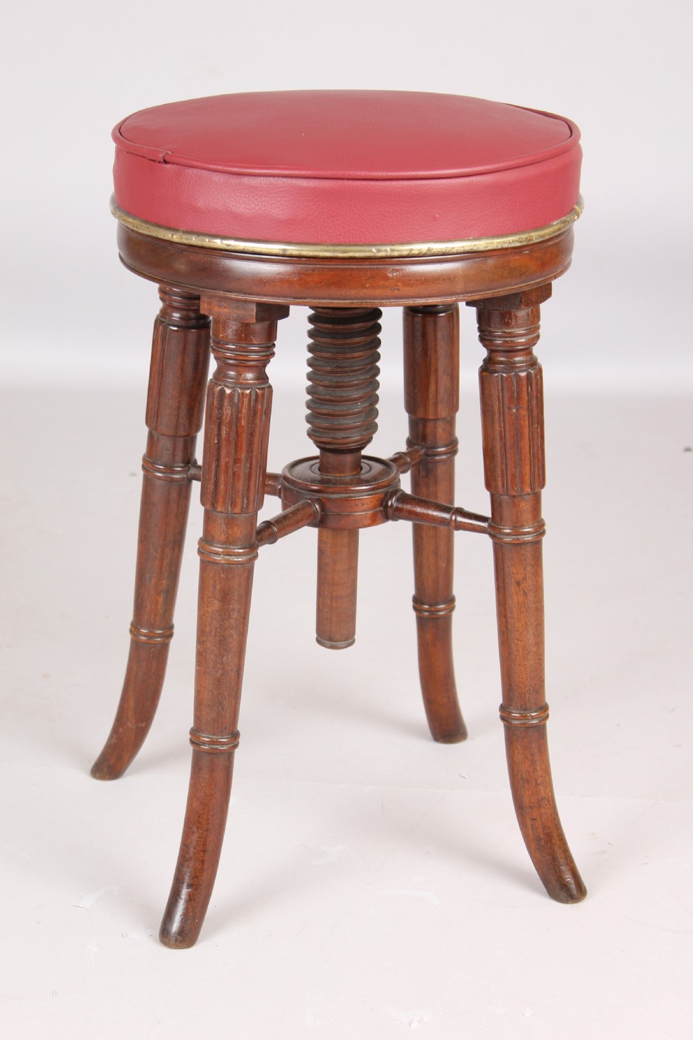 Early Victorian mahogany revolving piano stool View II