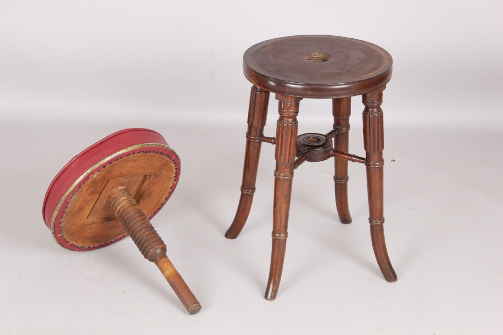 Early Victorian mahogany revolving piano stool View III