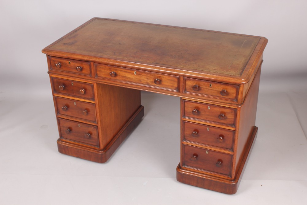Mahogany three part pedestal desk,