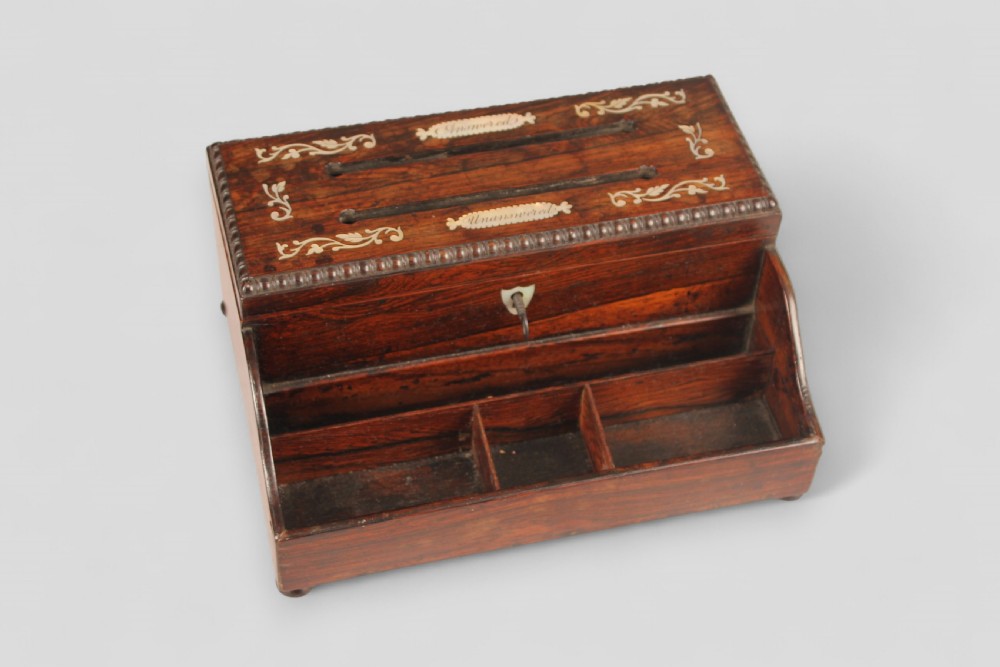 Victorian rosewood correspondence box with mother-of-pearl foliate inlay and slots labelled Answered and Unanswered above open front compartments.