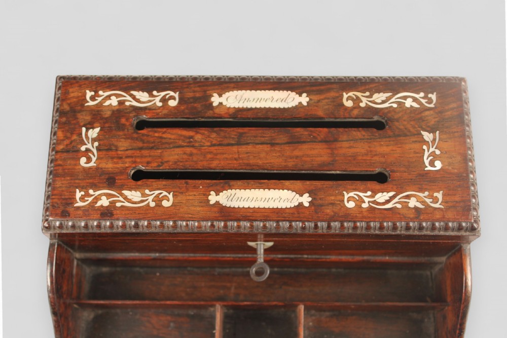 Victorian rosewood correspondence box with mother-of-pearl foliate inlay and slots labelled Answered and Unanswered above open front compartments. View II
