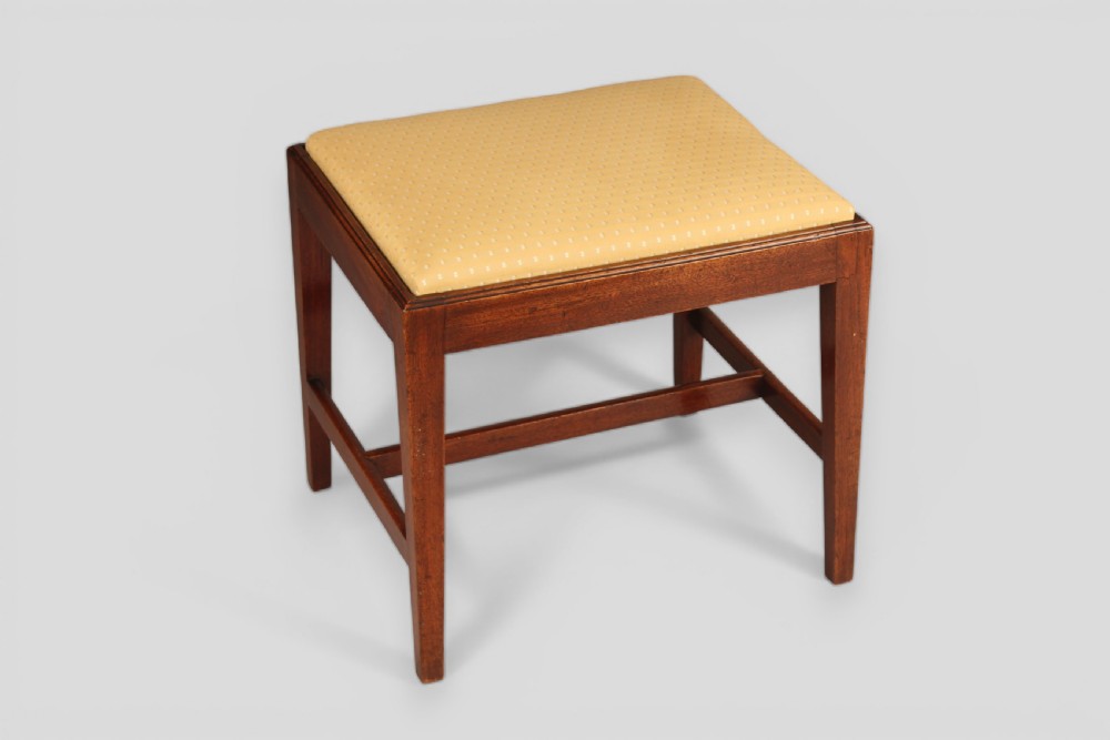A George III mahogany stool