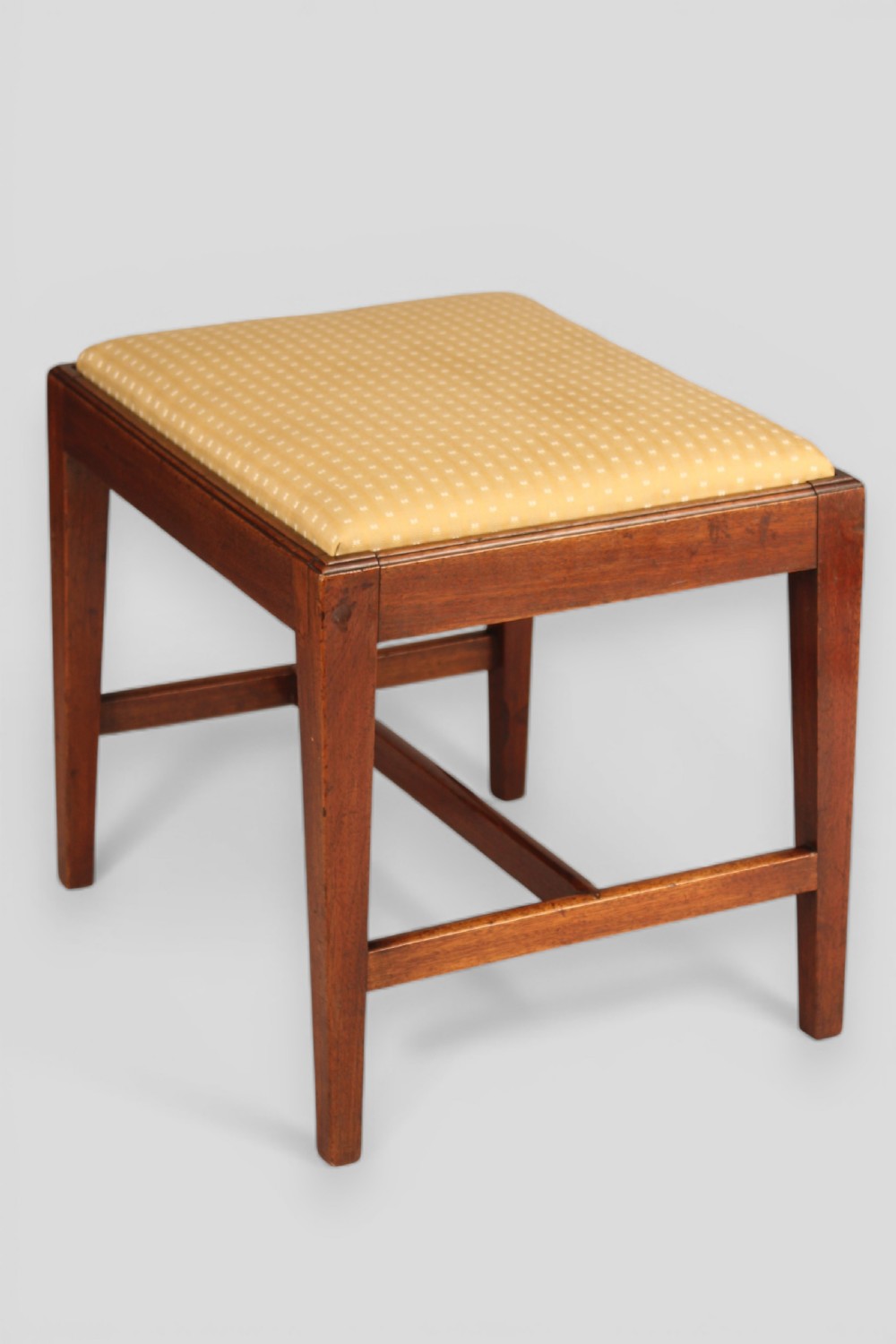 A George III mahogany stool View II
