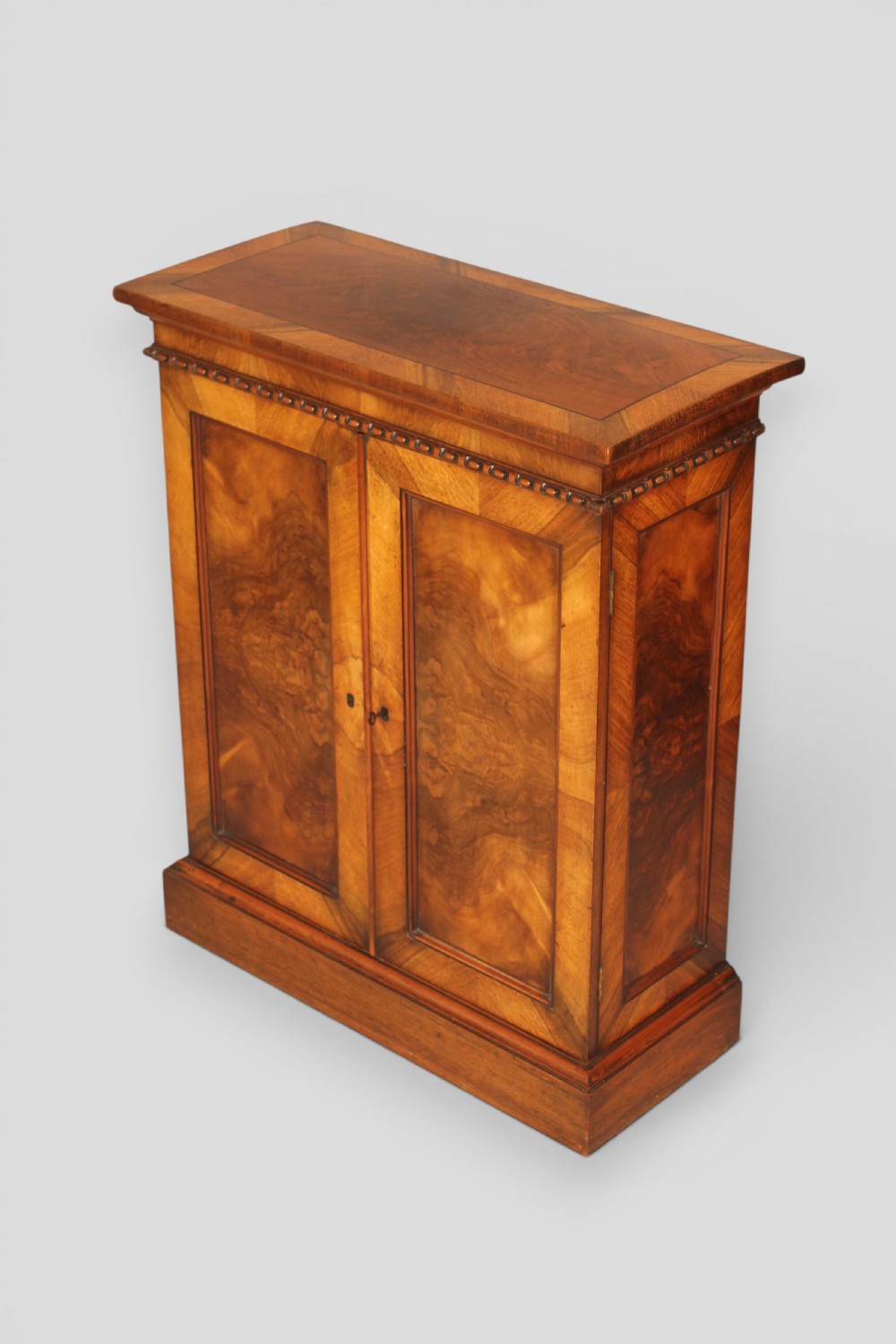 Small mahogany two-door cabinet