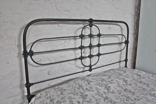 fig 1. All iron Irish aged black king size bedstead with no foot baord