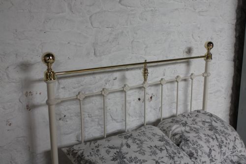 fig 1. Three quarter white classic Victorian brass and iron bedstead 