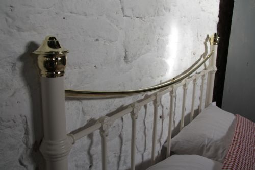 fig 2. Classic Victorian white and brass dip rail king size bedstead