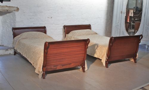 Pair of Mahogany Sleigh Beds with Swan Head Detail
