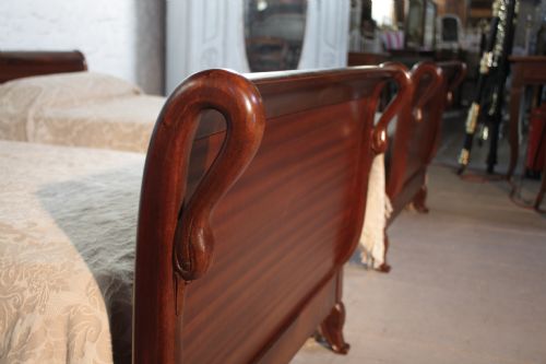 fig 2. Pair of mahogany sleigh beds with swan head detail