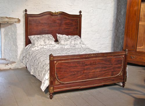 French Superior Quality Kingsize Mahogany and Fruit Wood Bed with Exquisite Brass Work Detail