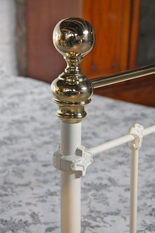fig 2. Classic Victorian white and brass double bed