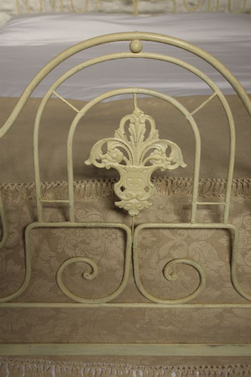 fig 1. Pretty forged iron cream king size bed