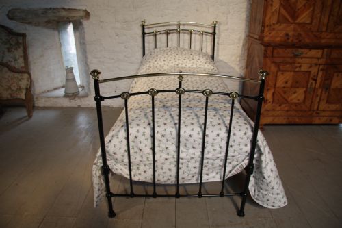 fig 1. Classic Victorian black and brass single bed