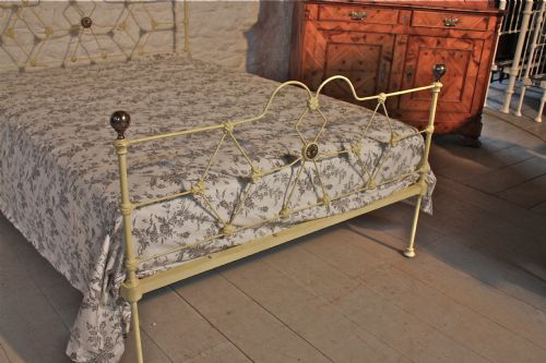 fig 2. Early Victorian double  aged cream iron low height bed