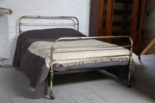 fig 1. Simple Victorian kingsize aged brass bedstead