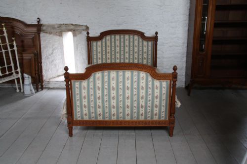 fig 1. Ornately carved French upholstered Henri 11