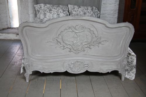 fig 2. Elaborate carved French Louis XV with cherubs painted in aged French grey