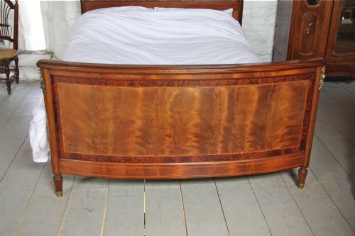 fig 2. French Walnut and mahogany king size bed with bronze rose mounts (matching armoire available)