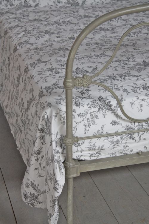 fig 2. Early all iron Irish bed in aged vintage retro paint colour